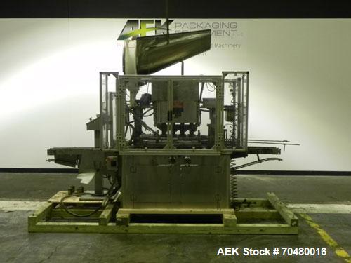 Used Resina Model U40-663 Automatic Inline Capper. Machine is capable of speeds up to 300 caps per minute. Adjustable from 10mm-70mm caps. Has top mounted cap sorter with hopper. Machine has 2HR pin ...