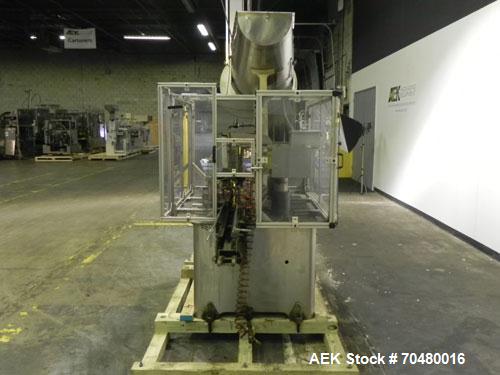 Used Resina Model U40-663 Automatic Inline Capper. Machine is capable of speeds up to 300 caps per minute. Adjustable from 10mm-70mm caps. Has top mounted cap sorter with hopper. Machine has 2HR pin ...