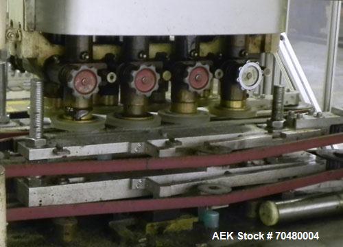 Used Resina Model U40 Automatic Inline Quill Capper. Capable of speeds up to 250 containers per minute. Cap size range 13mm to 70mm (with changeparts). Has 2HR pin style cap sorter, cap chute with no...