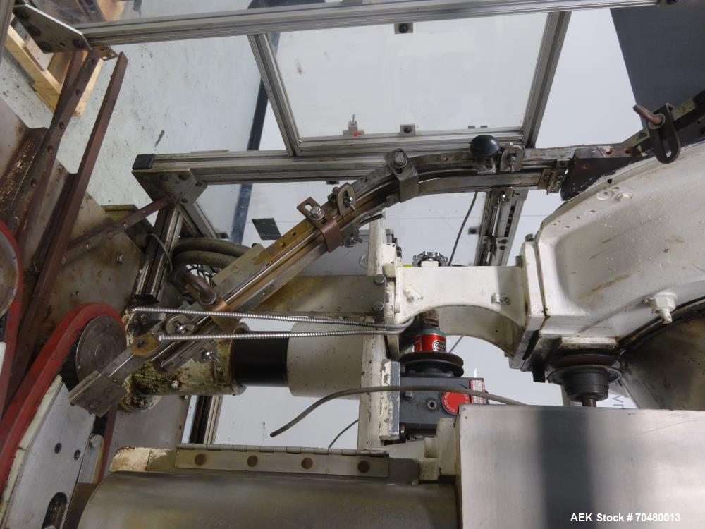 Used Resina Model U40-206 Automatic Inline Capper