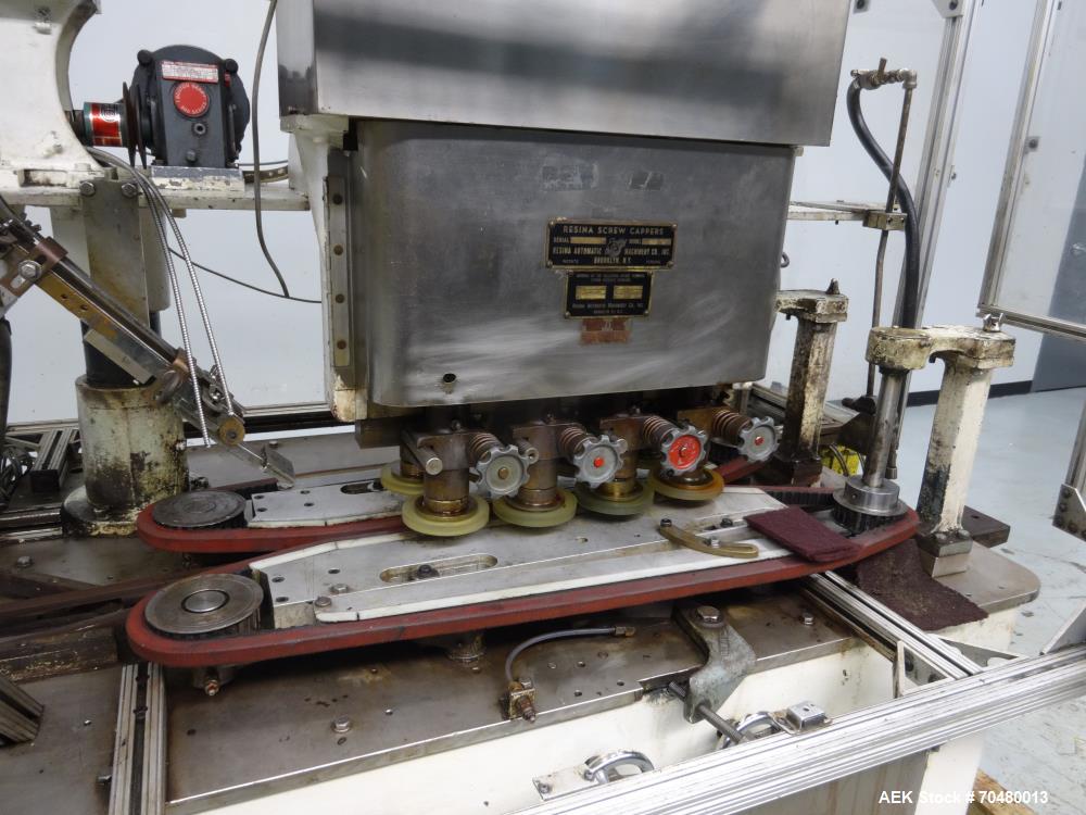 Used Resina Model U40-206 Automatic Inline Capper