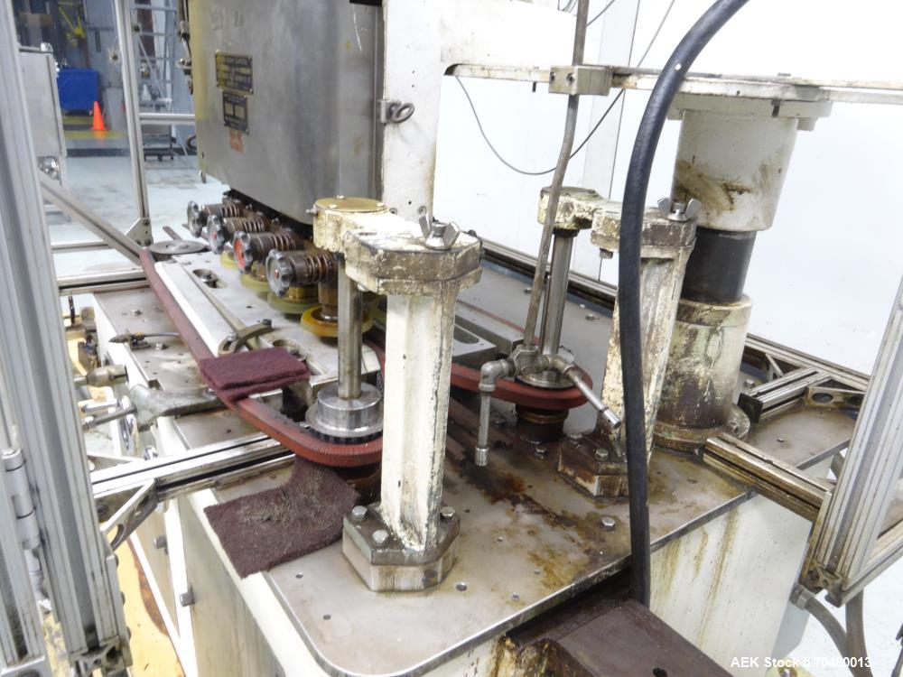 Used Resina Model U40-206 Automatic Inline Capper