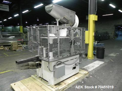 Used Resina Model U40 Automatic Inline Quill Capper. Capable of speeds up to 250 containers per minute. Cap size range: 13mm to 70mm (with changeparts). Currently set up on mm caps. Has 2HR pin style...