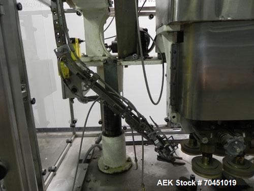 Used Resina Model U40 Automatic Inline Quill Capper. Capable of speeds up to 250 containers per minute. Cap size range: 13mm to 70mm (with changeparts). Currently set up on mm caps. Has 2HR pin style...