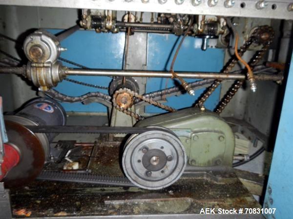 Used Resina Model U40 Automatic Inline Capper. Machine is capable of speeds up to 300 caps per minute. Is a 4 station capper with 8 spindle quills. Adjustable from 10mm-70mm caps. Has top mounted cap...