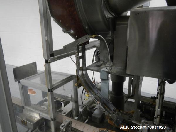 Used- Resina Model U40 Automatic Inline Capper. Machine is capable of speeds up to 300 caps per minute. Is a 4 station cappe...