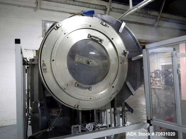 Used Resina Model U40 Automatic Inline Capper. Machine is capable of speeds up to 300 caps per minute. Is a 4 station capper with 8 spindle quills. Adjustable from 10mm-70mm caps. Has top mounted cap...