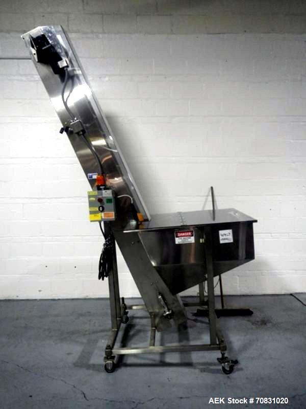 Used- Resina Model U40 Automatic Inline Capper. Machine is capable of speeds up to 300 caps per minute. Is a 4 station cappe...