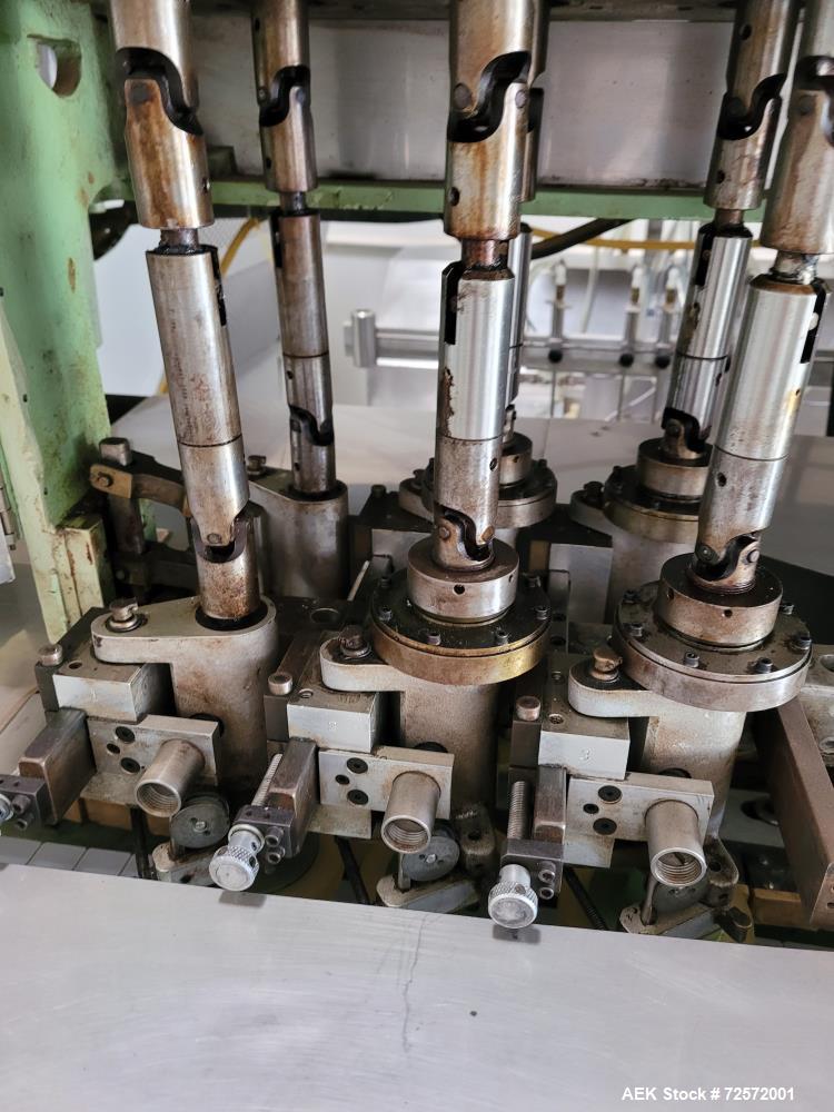 Used Resina Model U40 Automatic Inline Capper