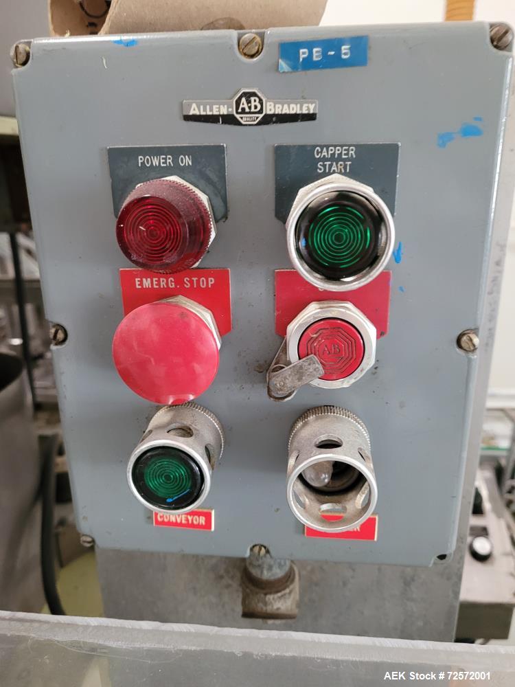 Used Resina Model U40 Automatic Inline Capper