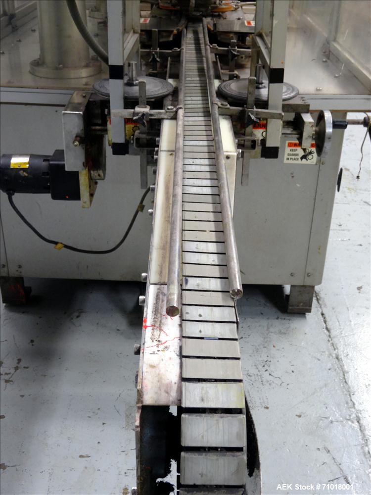 Used Resina Model UN30 Automatic Inline Quill Screw Capper