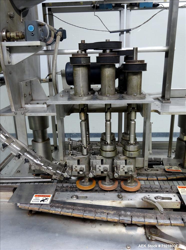 Used Resina Model UN30 Automatic Inline Quill Screw Capper
