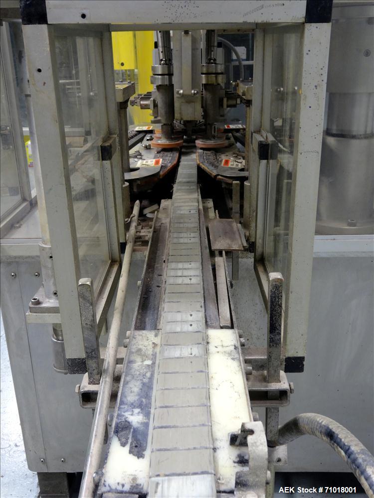 Used Resina Model UN30 Automatic Inline Quill Screw Capper