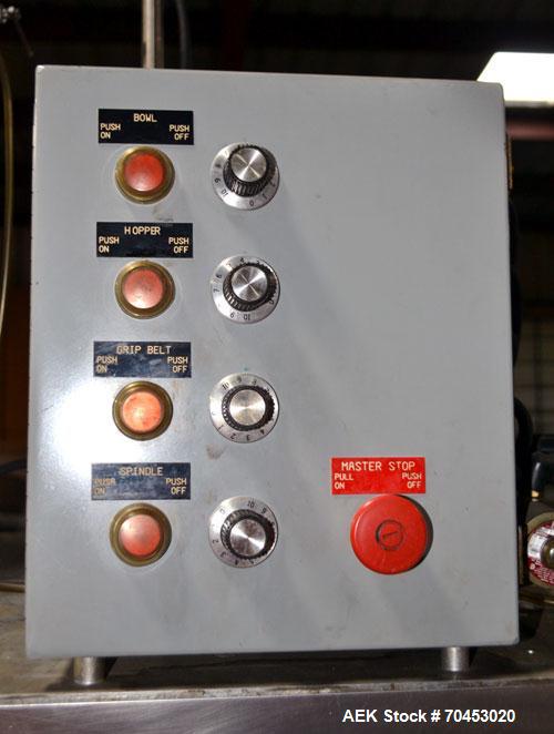 Used Sure Kap SK6000-18 Quill capper. Three spindle capper with adjustable chute will handle caps from 13 to 110MM w/o changeparts. Has dual gripper belts, C frame construction will mount up to any c...