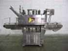 Used Diversified 76-450 Steam Capper designed to displace the air in the closure and head space of the container with steam. Automatically applies lug or PT style caps onto glass containers. Currentl...