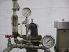 Used Diversified 76-450 Steam Capper designed to displace the air in the closure and head space of the container with steam. Automatically applies lug or PT style caps onto glass containers. Currentl...