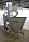 Used Accutek Inline Quill Capper, Model A-17. Set-up with 6-spindles and side-belt container transfer. Approximate speed 200 CPM. Approximate cap size range: 10mm to 120mm. Includes Accutek waterfall...