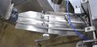 Used Accutek Inline Quill Capper, Model A-17. Set-up with 6-spindles and side-belt container transfer. Approximate speed 200 CPM. Approximate cap size range: 10mm to 120mm. Includes Accutek waterfall...