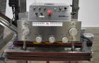 Used Accutek Inline Quill Capper, Model A-17. Set-up with 6-spindles and side-belt container transfer. Approximate speed 200 CPM. Approximate cap size range: 10mm to 120mm. Includes Accutek waterfall...