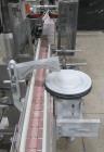 Used Aesus Capper, Model Delta Cap-4. With conveyor. 1/60/208V.