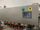 Used CVC Automatic Inline Quill Capper