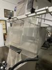 Used CVC Automatic Inline Quill Capper