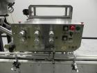 Used ELF Model CT400L Automatic Inline Quill Capper. Fully adjustable for a cap size range of 8mm - 110mm wide and a container size range of 1