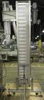 Used Inline Filling Systems Automatic Belt Capper. Machine is rated at up to 200 caps per minute depending on cap size and container configuration. Capper main unit can handle a cap size range up to ...