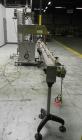Used Inline Filling Systems inline belt capper with automatic cleated belt cap elevator. Capable of speeds up to 200 CPM (depending on cap size and container configuration). Has a container size rang...