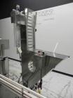 Used Inline Filling Systems inline belt capper with automatic cleated belt cap elevator. Capable of speeds up to 200 CPM (depending on cap size and container configuration). Has a container size rang...