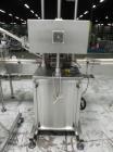 Used Inline Filling Systems inline belt capper with automatic cleated belt cap elevator. Capable of speeds up to 200 CPM (depending on cap size and container configuration). Has a container size rang...