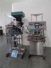 Used Inline Filling Systems Capper.  110V, 60 cycle.  Includes hopper and quality feeder Model 21CCW.  Manufactured 2002.