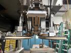 Used Kapsall Model A 2Inline Screw Capper. Capable of speeds up to 150 bottles per minute. Has single bottle grippers, three pair spindles  with adjustable cap chute and integrated cap elevator. Cap ...