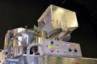 Used Kapsall Model A Inline Screw Capper. Capable of speeds up to 200 bottles per minute. Has dual bottle grippers, three pair spindles and 24