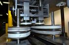 Used Kapsall Model A Inline Screw Capper. Capable of speeds up to 200 bottles per minute. Has dual bottle grippers, three pair spindles and 24