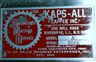 Used Kapsall Model A Inline Screw Capper. Capable of speeds up to 200 bottles per minute. Has dual bottle grippers, three pair spindles and 24