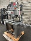 Used- Kapsall Model A Inline Screw Capper. Capable of speeds up to 200 bottles per minute. Has single bottle grippers, three...