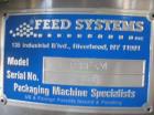 Used KapsAll, Model C-8, Automatic (8) Spindle Capper. Single belt container gripper. Manufacture stated cap size range 8mm-120mm (with proper change parts).