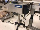 Used KapsAll Capper, model E. 4-spindle capper