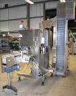 Used New Jersey Machine (NJM) Model Unicap-150 Automatic Inline Quill Capper.