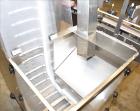 Used New Jersey Machine (NJM) Model Unicap-150 Automatic Inline Quill Capper.