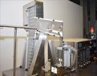 Used New Jersey Machine (NJM) Model Unicap-150 Automatic Inline Quill Capper.