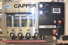 Used New Jersey Machine (NJM) Model Unicap-150 Automatic Inline Quill Capper.