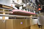 Used New Jersey Machine (NJM) Model Unicap-150 Automatic Inline Quill Capper.