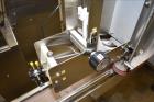 Used New Jersey Machine (NJM) Model Unicap-150 Automatic Inline Quill Capper.