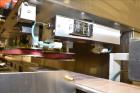 Used New Jersey Machine (NJM) Model Unicap-150 Automatic Inline Quill Capper.