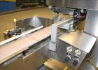 Used New Jersey Machine (NJM) Model Unicap-150 Automatic Inline Quill Capper.