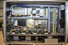 Used New Jersey Machine (NJM) Model Unicap-150 Automatic Inline Quill Capper.