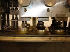 Used SureKap 3 Spindle Quill Capper, Model SK6000-SP18M. Adjustable chute will handle caps from 13 to 110mm without change parts. Has dual gripper belts, C frame construction will mount up to any con...