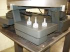 Used SureKap 3 Spindle Quill Capper, Model SK6000-SP18M. Adjustable chute will handle caps from 13 to 110mm without change parts. Has dual gripper belts, C frame construction will mount up to any con...